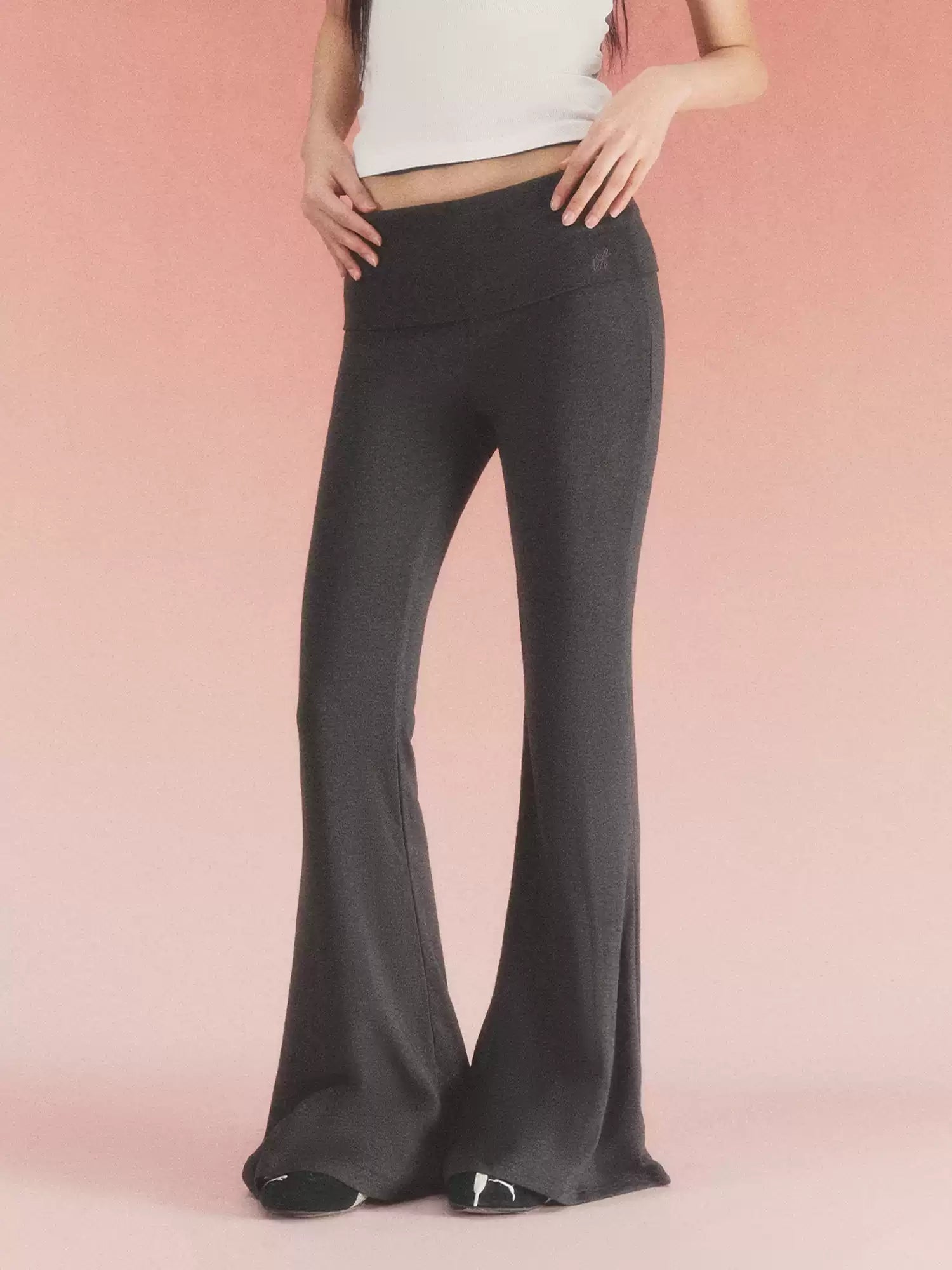 Fold-over waist flared knit pants in black