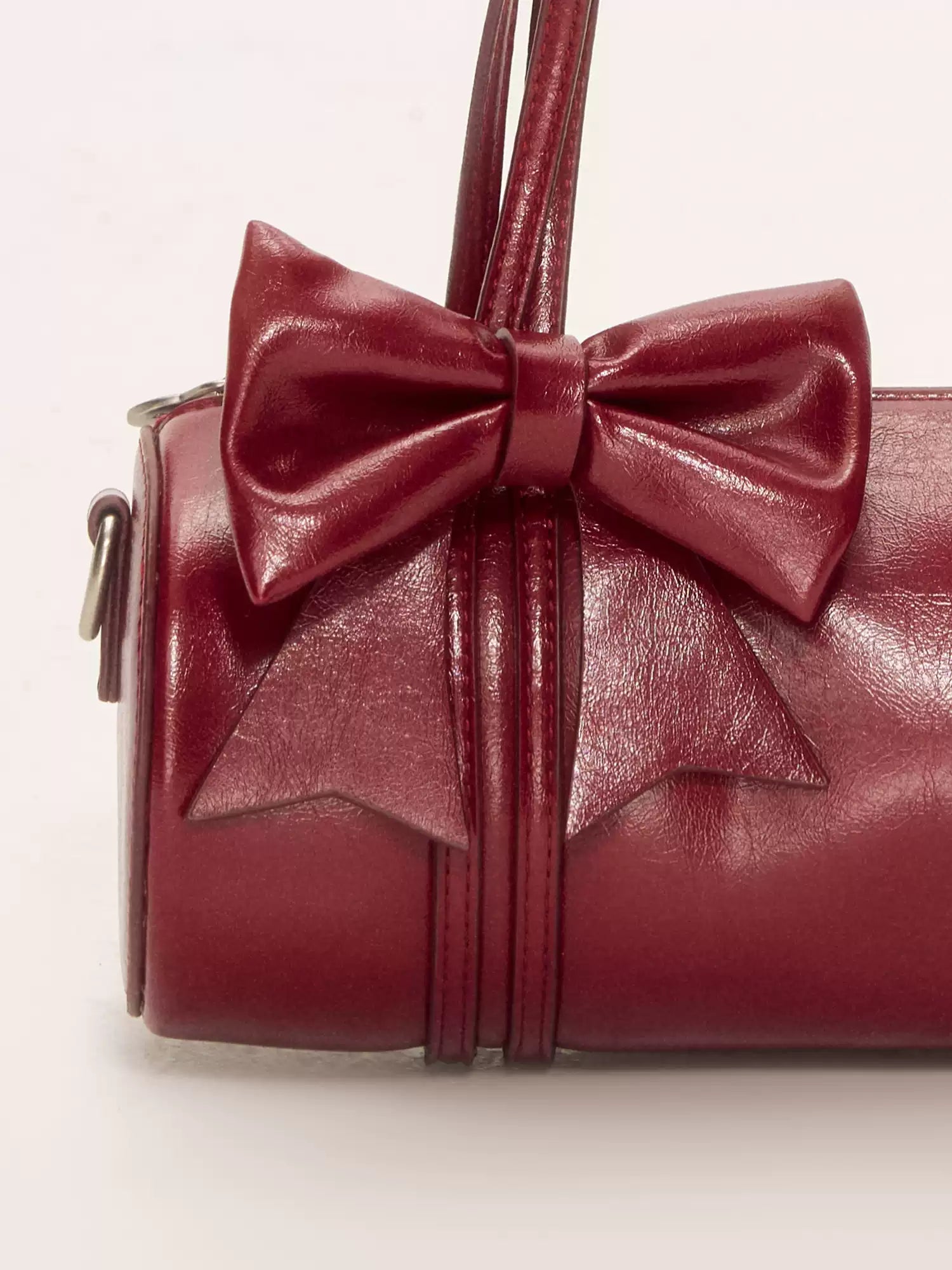 Double ribbon underarm shoulder bag in red