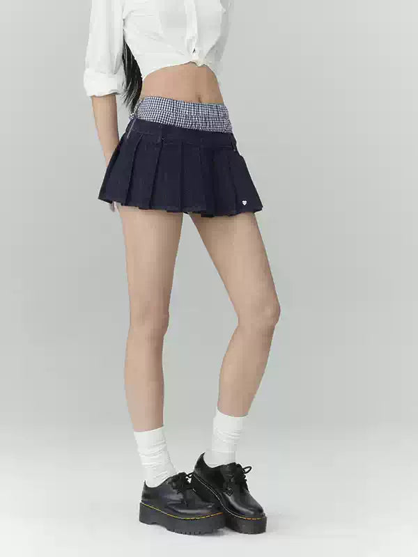 Pleated denim A-line mini skirt in navy blue