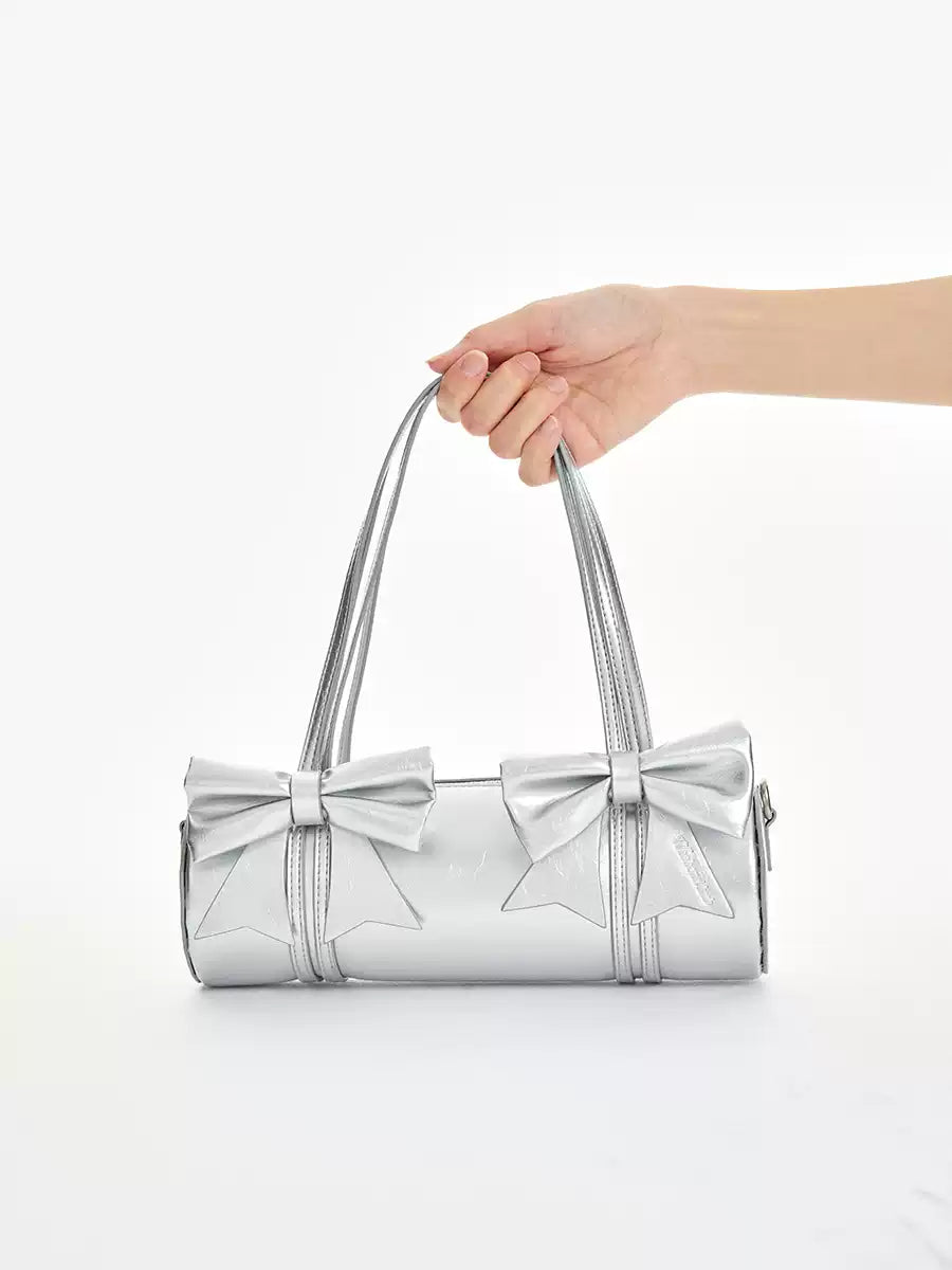 Double ribbon underarm shoulder bag in pink