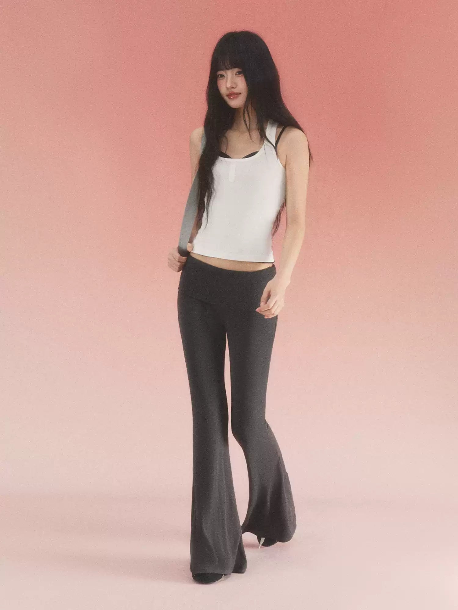 Fold-over waist flared knit pants in black