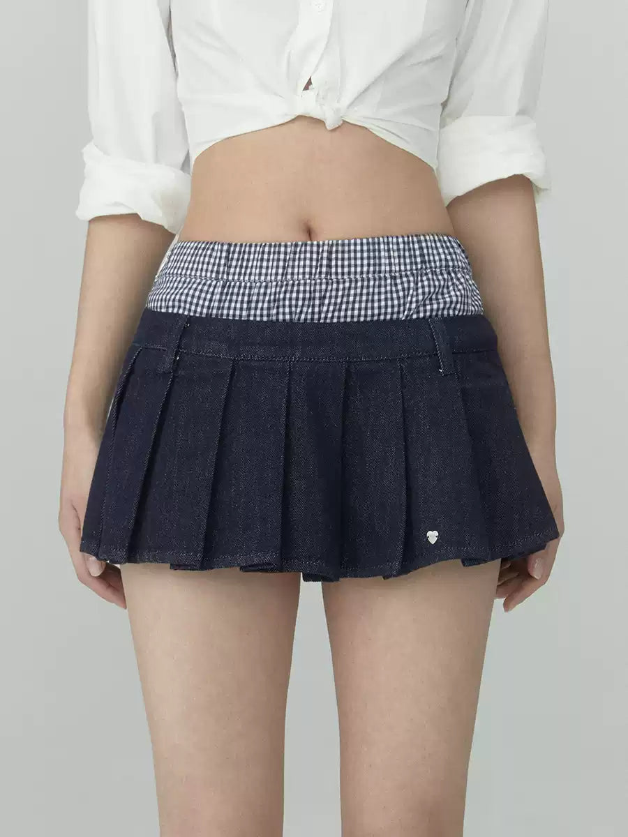 Pleated denim A-line mini skirt in navy blue