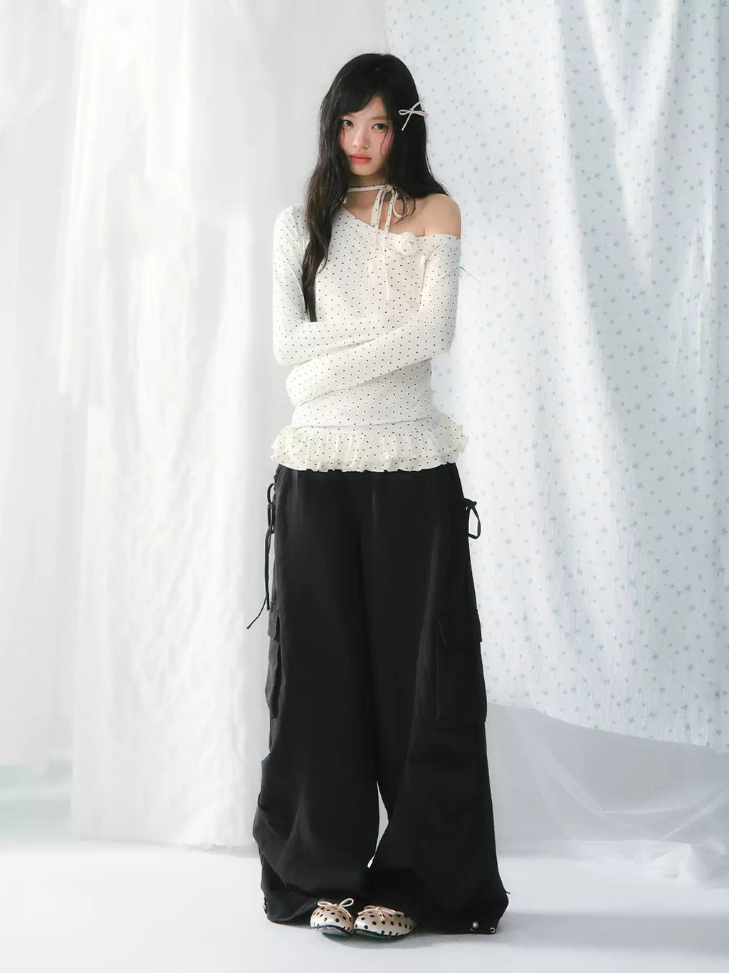 White polka dot ruffled one-shoulder long sleeve top