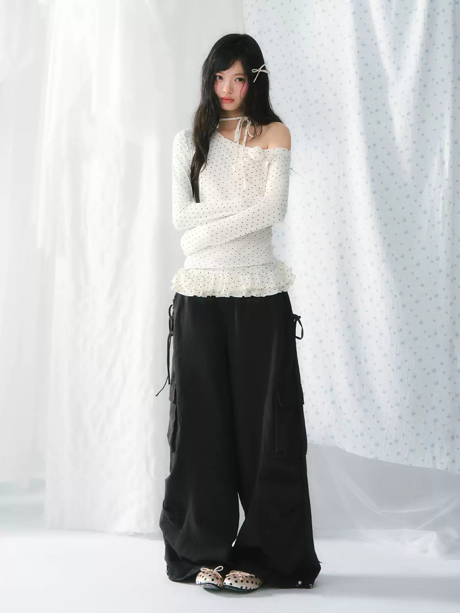 White polka dot ruffled one-shoulder long sleeve top