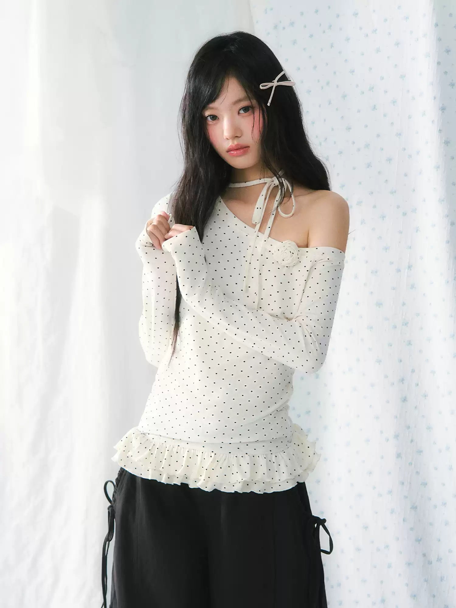 White polka dot ruffled one-shoulder long sleeve top
