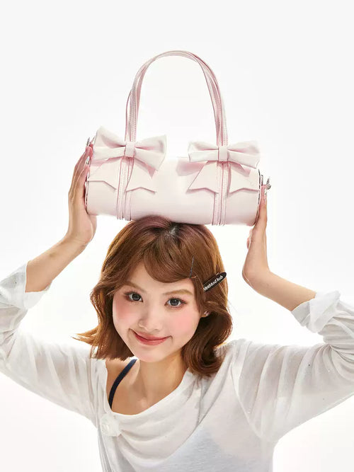 Double ribbon underarm shoulder bag in pink